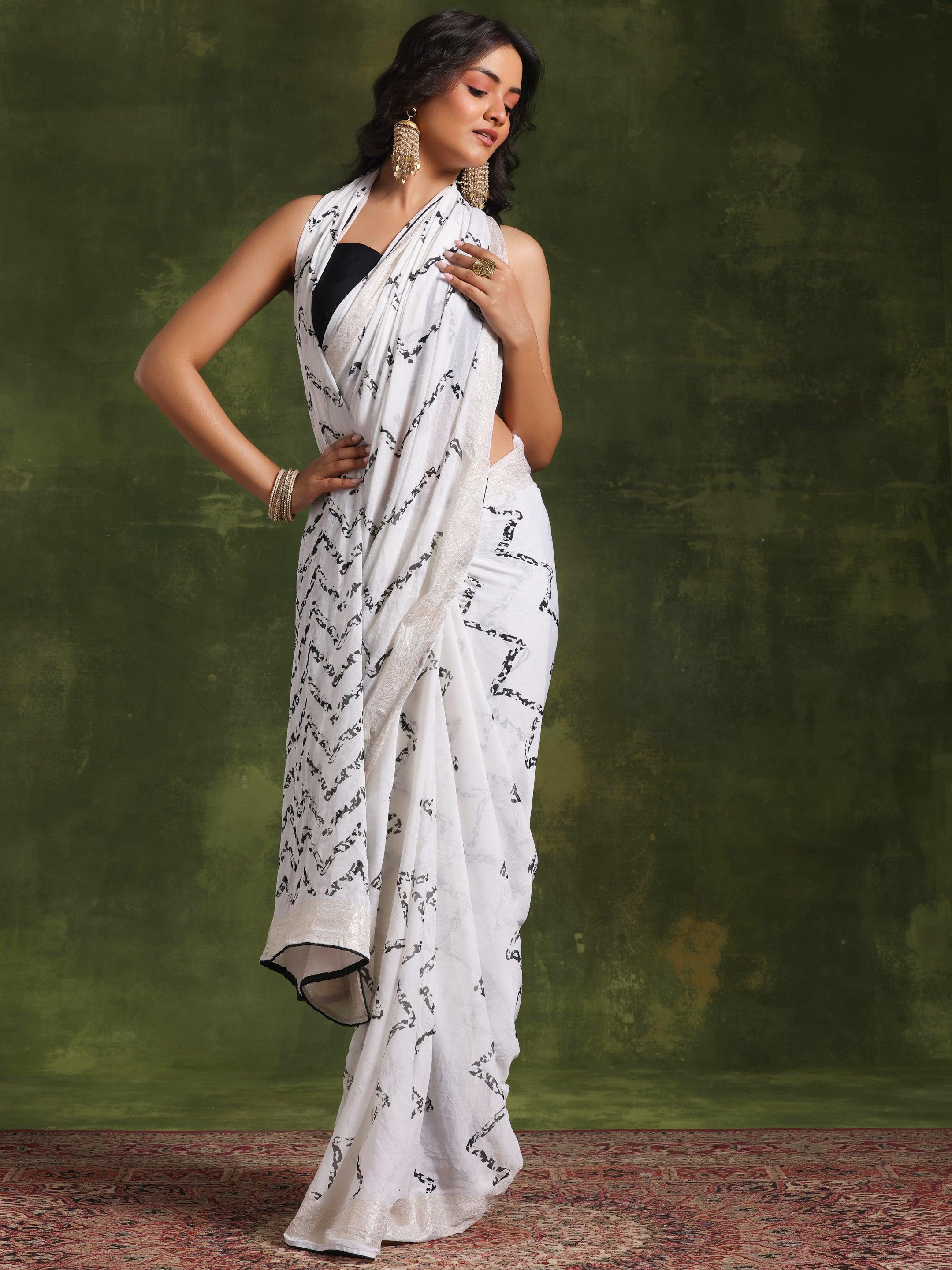 Off White Printed Poly Georgette Saree With Unstitched Blouse Piece