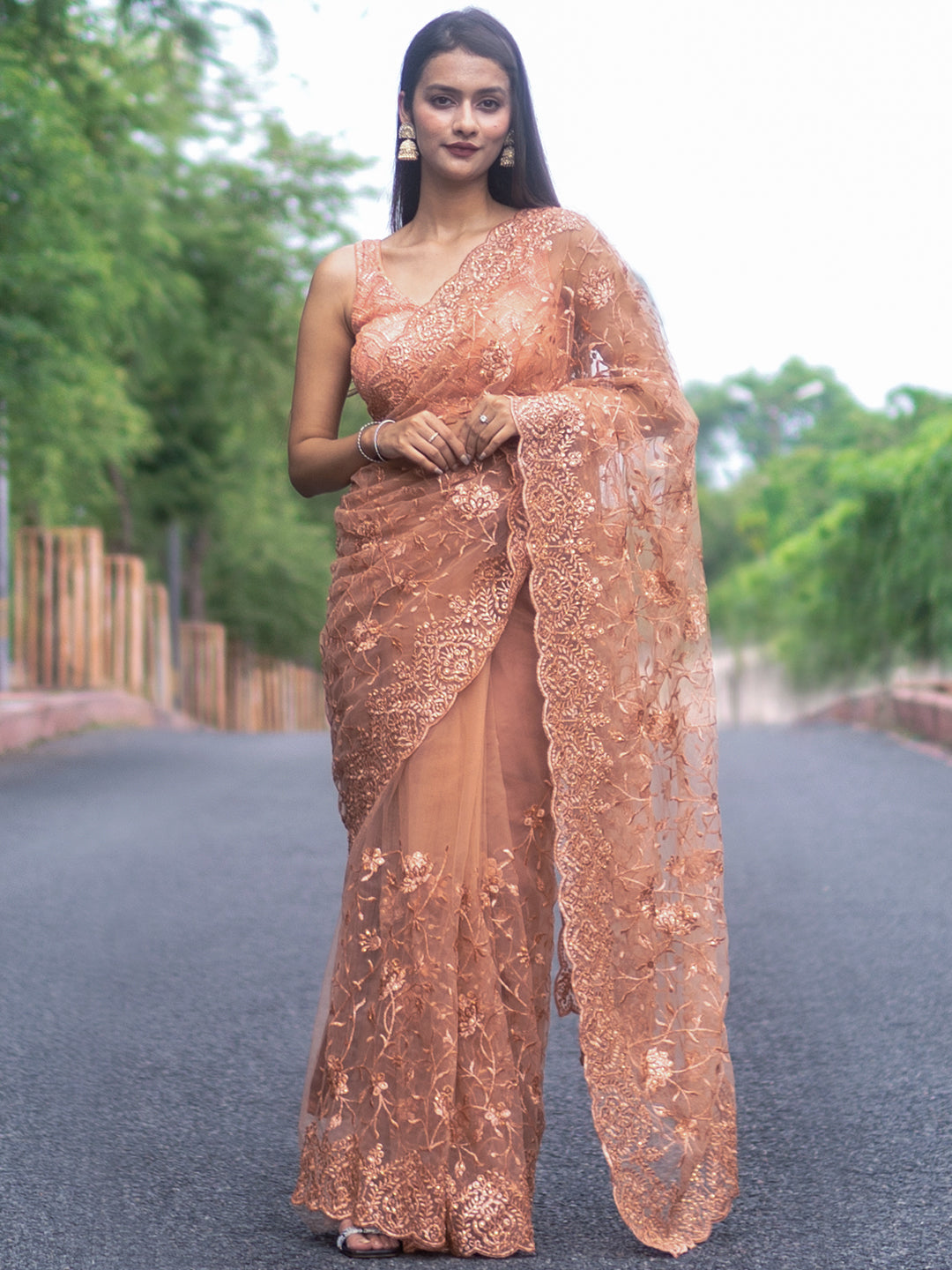 Peach Embroidered Net Saree