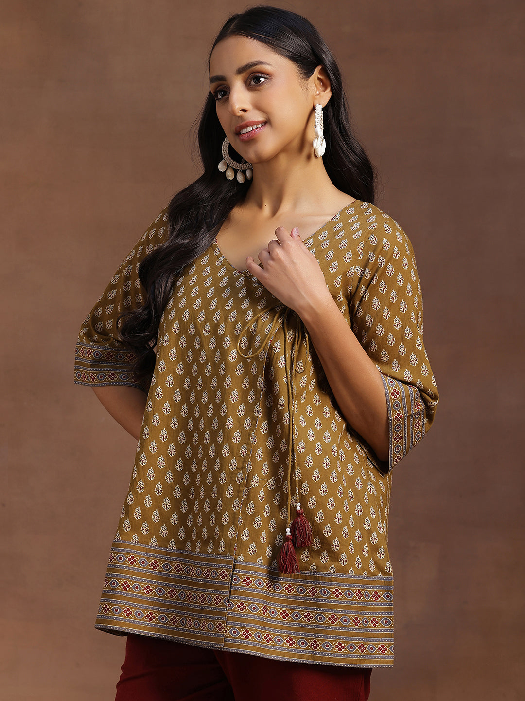 Mustard Printed Cotton A-line Kurti