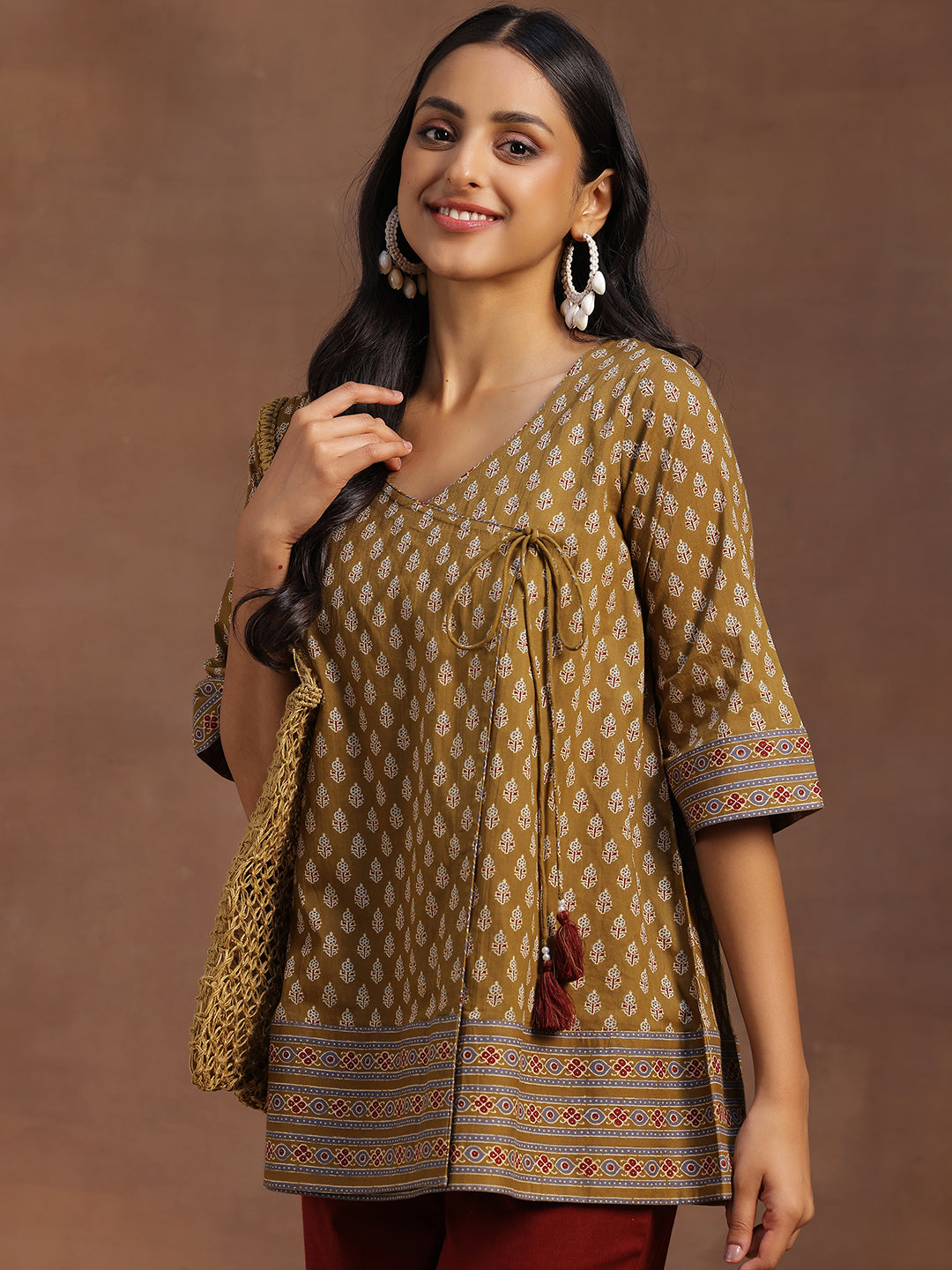 Mustard Printed Cotton A-line Kurti