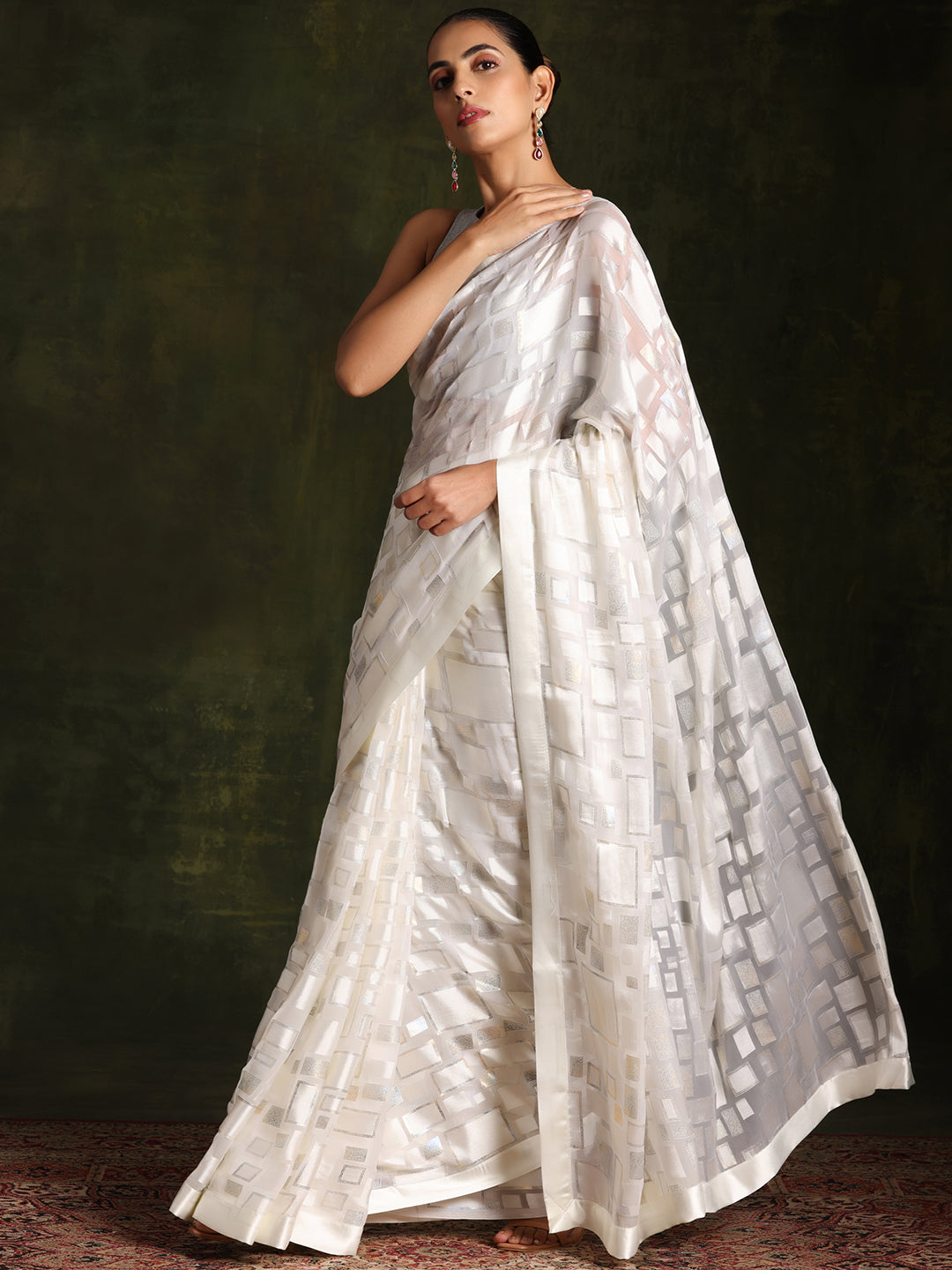 Off White Woven Design Brasso Saree With Unstitched Blouse Piece