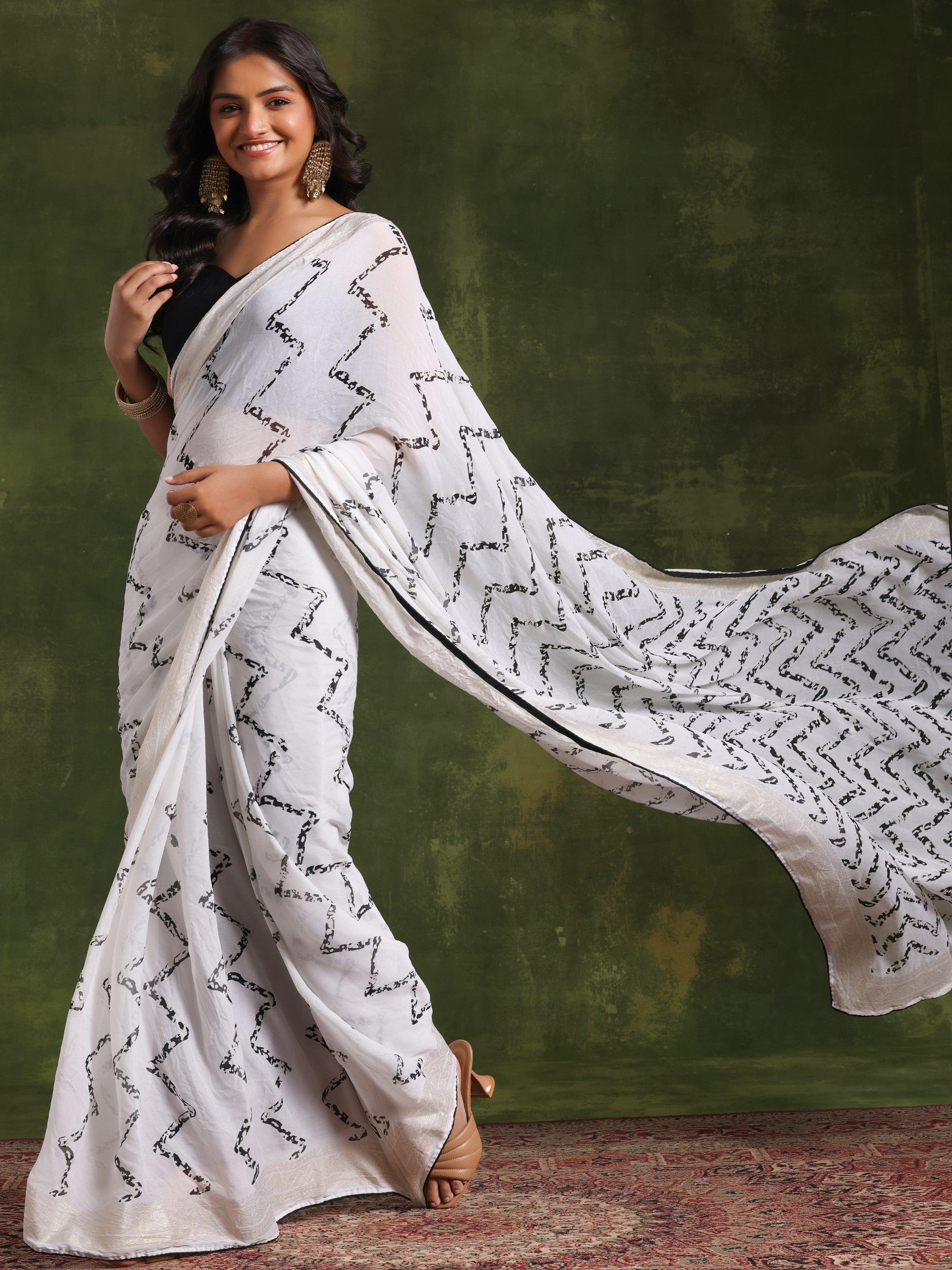 Off White Printed Poly Georgette Saree With Unstitched Blouse Piece