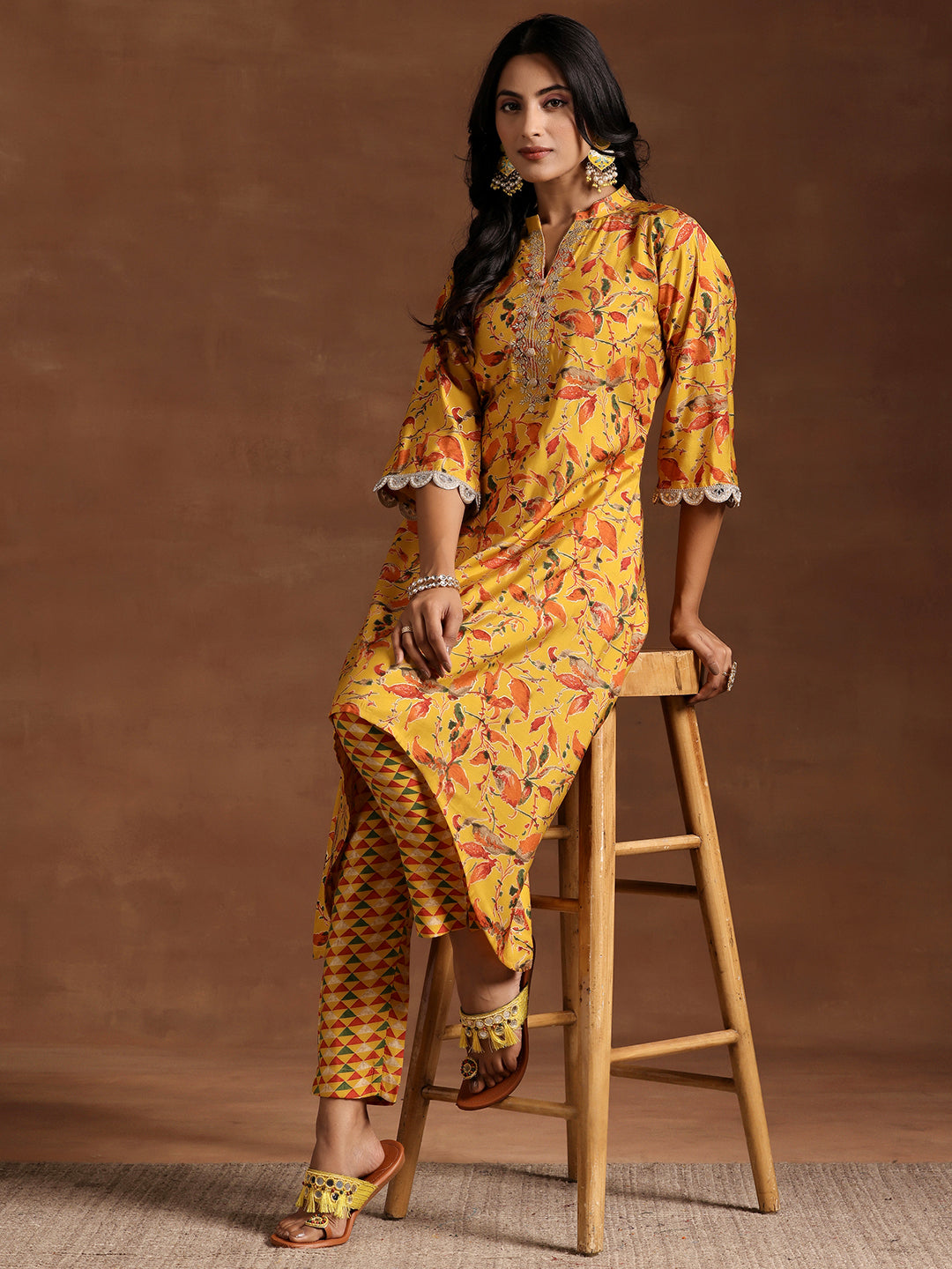 Mustard Printed Silk Blend A-line Kurta With Trousers