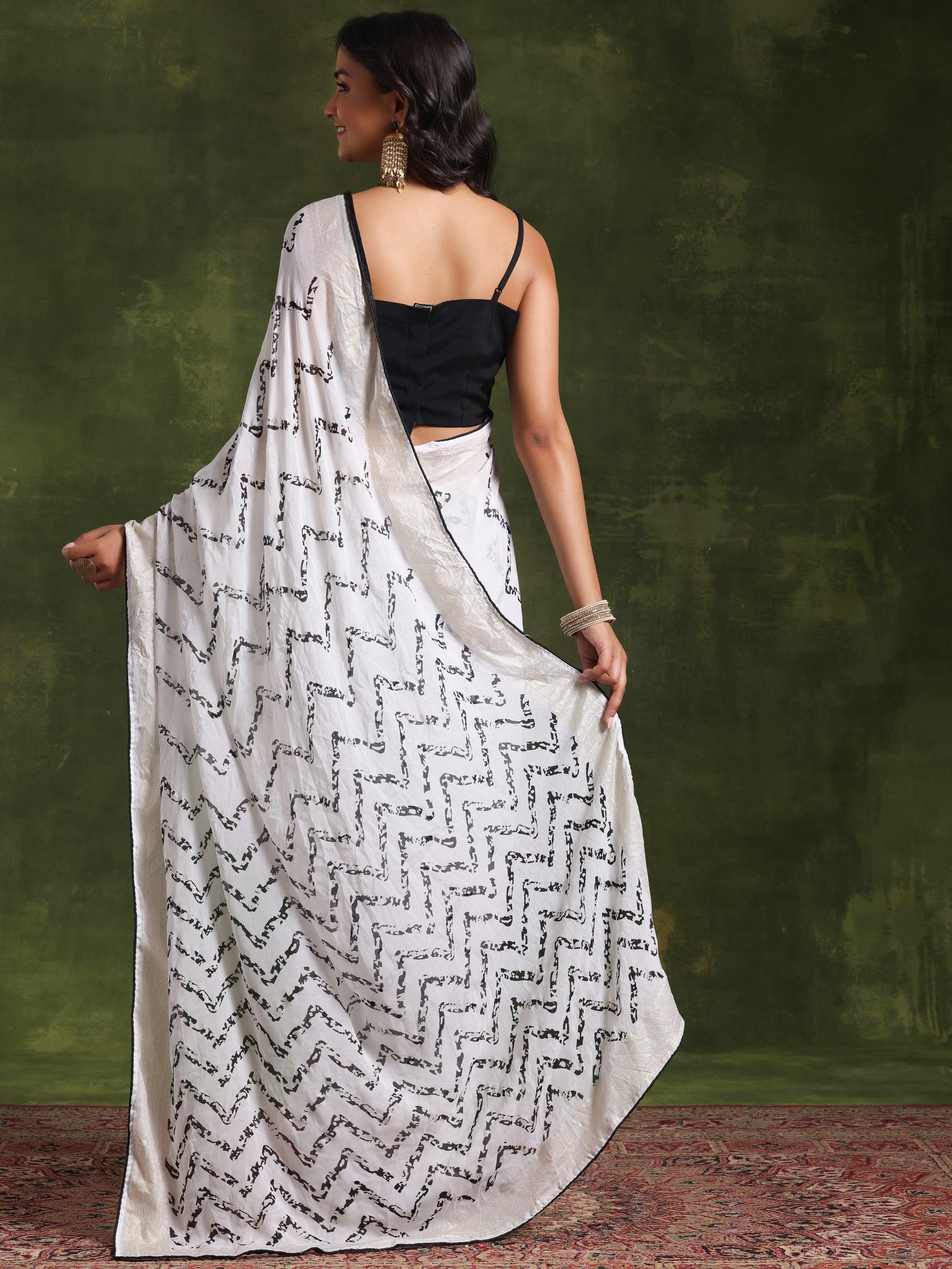 Off White Printed Poly Georgette Saree With Unstitched Blouse Piece