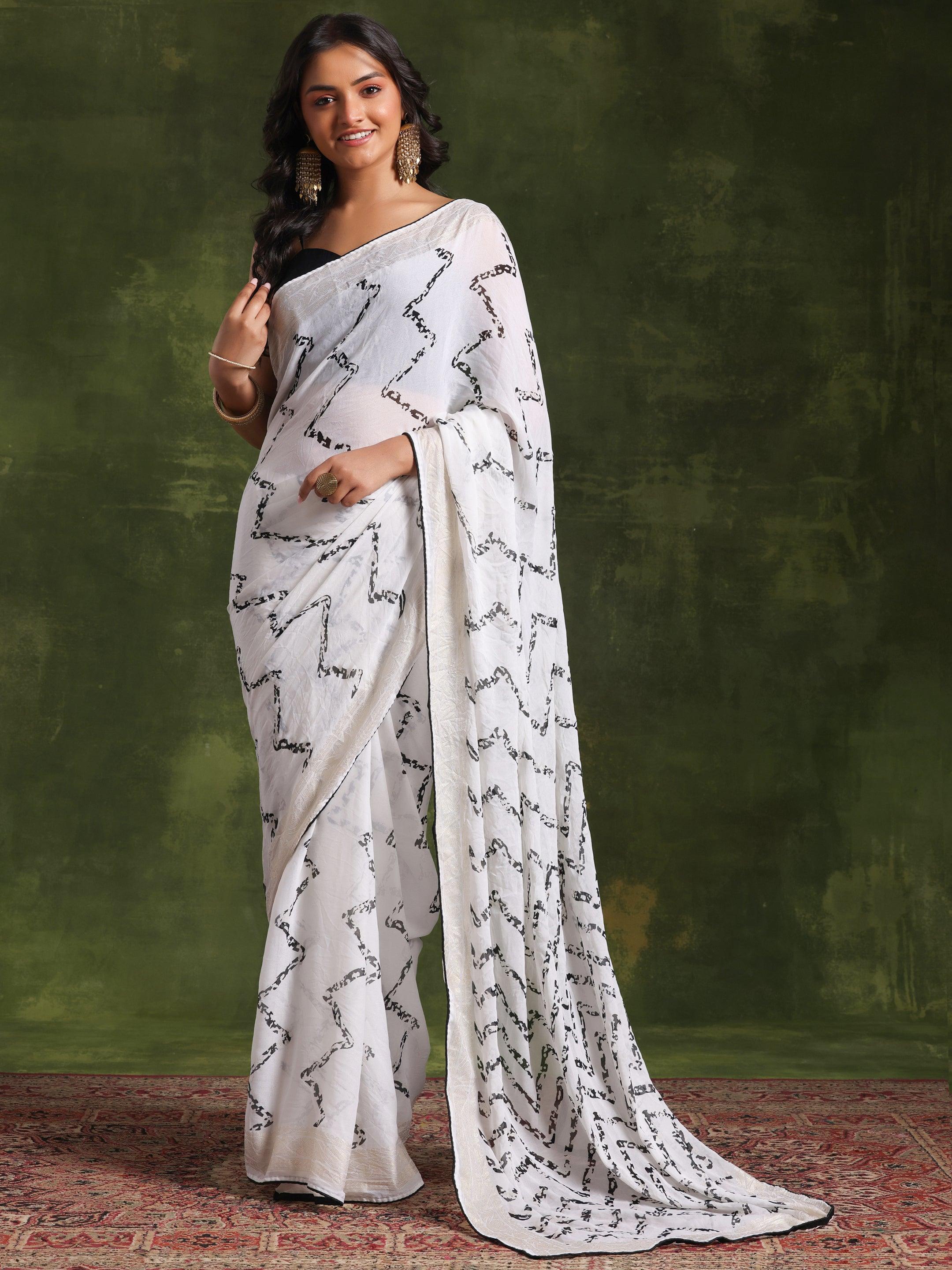 Off White Printed Poly Georgette Saree With Unstitched Blouse Piece