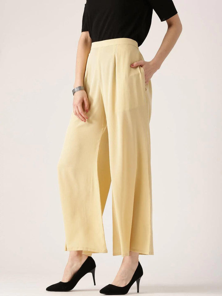 Beige Solid Crepe Palazzos - ShopLibas