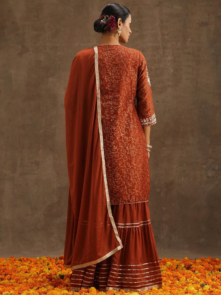 Rust Yoke Design Silk Blend Suit Set With Sharara - ShopLibas